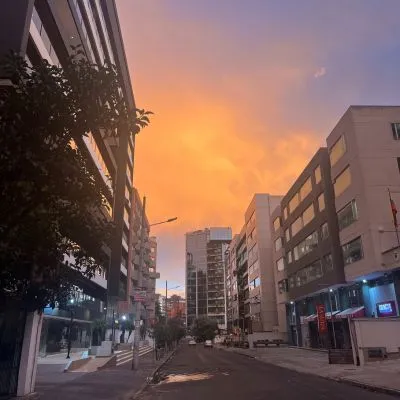 A purple and orange sunset in downtown Quito, Ecuador.